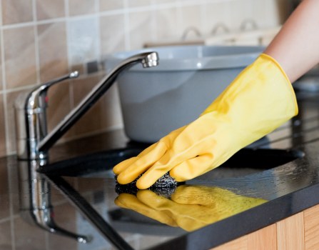 Professional cleaner in SW7 maintaining a spotless London home