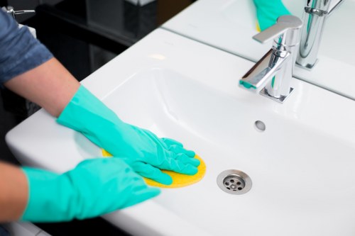 Technician managing carpet cleaning chemicals safely